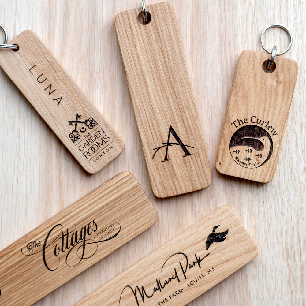 Engraved wooden keyring with custom logos